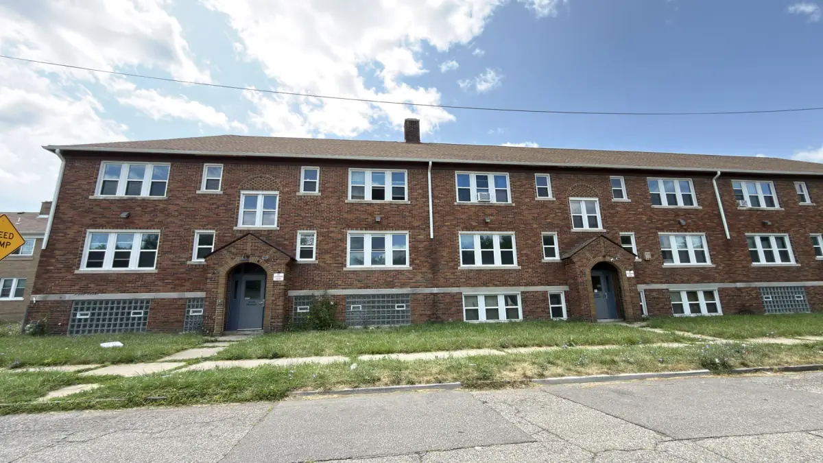 8525, 8535 & 8545 Maxwell St — brick building with arched entrances
